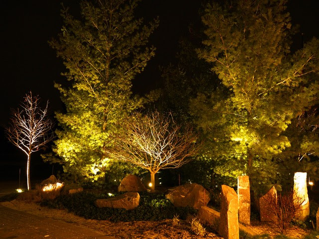 Stone patio with path lighting at dusk